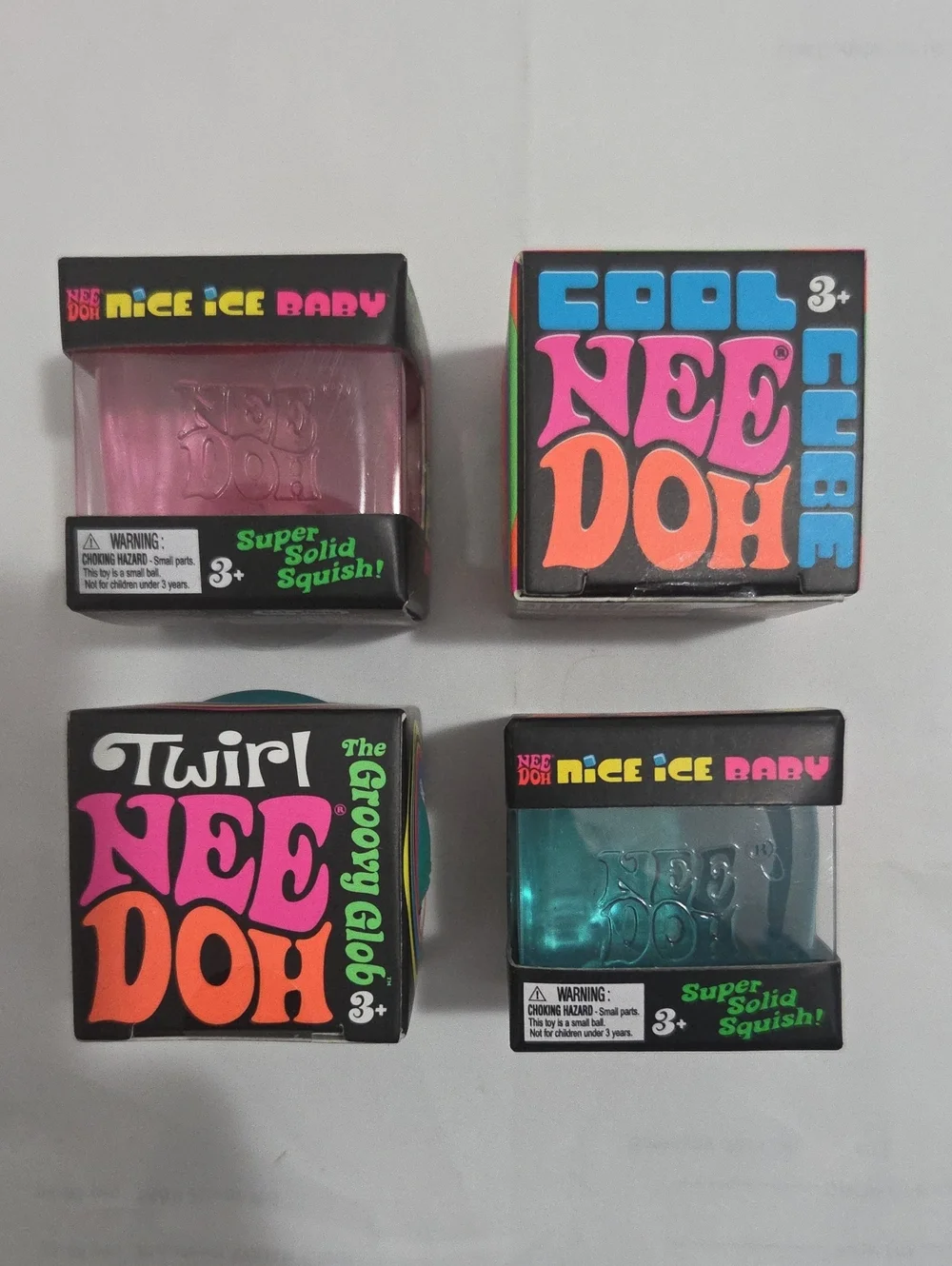 Nee Doh Cube & Twirl Set - Pink,Green & Teal Squish Toys